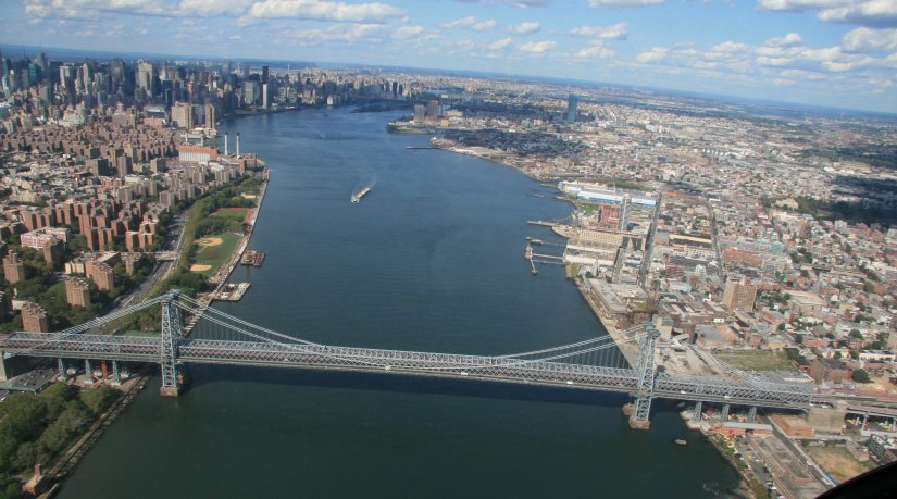 The Williamsburg Bridge over the East River from helicopter