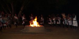Dance around bonfire at the Safari Narayani Lodge