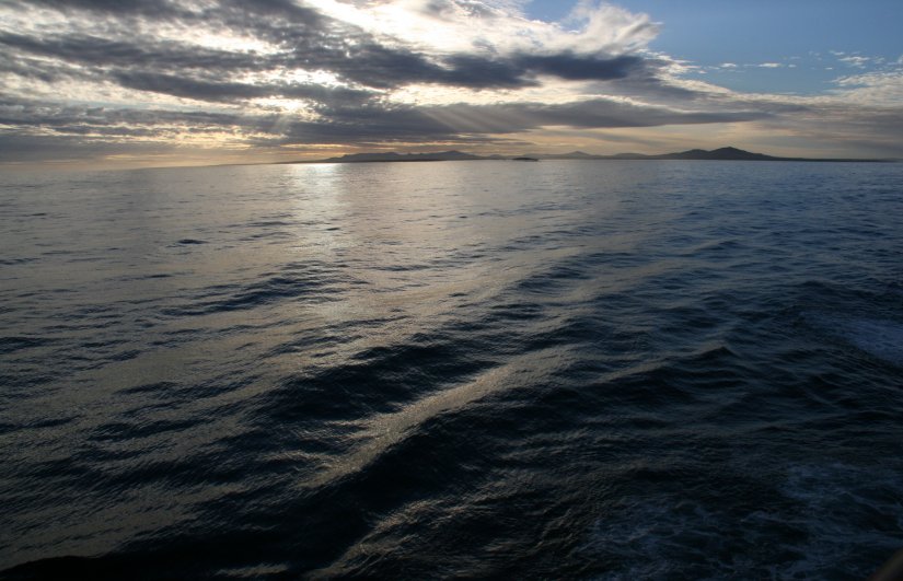 The sun sets as we Sail away from the Falkland Islands