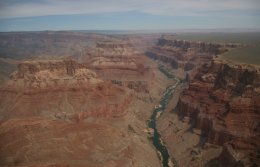 Colorado River running through Grand Canyon from helicopter