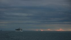 The sun sets over the Strait of Georgia