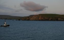 Sailing into the Shetland Islands at sunrise