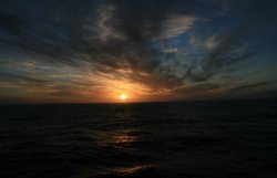 The sun sets as we Sail away from the Falkland Islands