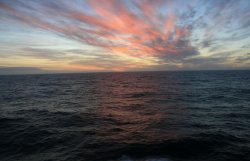 The sun sets as we Sail away from the Falkland Islands