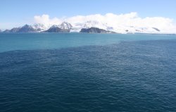 Melting glacier ice makes noticable line in water