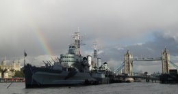 A rainbow behind the HMS Belfast in London, England